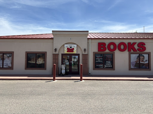 Under Charlie's Covers - Fine Used Books